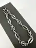 bracelet des maillons ovales lisses et des motifs ajourés en filigrane argent autre 4,99g
