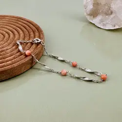 bracelet en argent et et orné de peties corail rose argent autre 2,87g