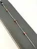 bracelet fin en argent avec petites perles crème et goldstone cuivrée argent autre 1,55g