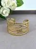 bracelet / jonc en métal doré