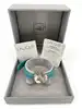 bracelet lalique accroche coeur en cuir turquoise et cristal satiné