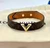 bracelet louis vuitton essential v en toile monogtam à finition métal doré