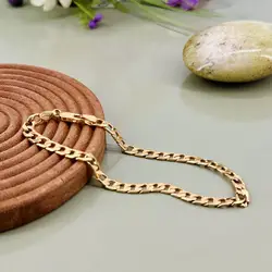 bracelet maille goumette en métal doré