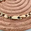bracelet maille goumette en métal doré