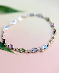 bracelet rivière serti des pierres de couleur or 750 millième (18 ct) 4,88g