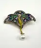 broche en émail fée en métal doré