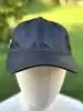 casquette de baseball prada en nylon tessuto & cuir noir-logo émaillé argenté & boucle dorée taille m
