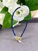 clpi bracelet billes en pierre saphir d3mm et métal doré l16-22 cm