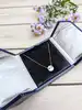 collier chaumet jeux de liens harmony en or rose avec un pendentif rond en nacre serti de petits diamants or 750 millième (18 ct) 