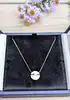 collier chaumet jeux de liens harmony en or rose avec un pendentif rond en nacre serti de petits diamants or 750 millième (18 ct) 