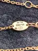 collier chaumet jeux de liens harmony en or rose avec un pendentif rond en nacre serti de petits diamants or 750 millième (18 ct) 