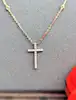 collier messika en or rose avec un pendentif croix serti des petits diamants d'environ 0,17ct au total or 750 millième (18 ct) 2,5