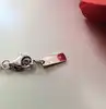 collier messika en or rose avec un pendentif croix serti des petits diamants d'environ 0,17ct au total or 750 millième (18 ct) 2,5