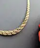 collier or maille palmier plate en chute or 750 millième (18 ct) 6,75g