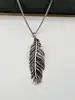 collier thomas sabot maille gourmette avec pendentif plume argent 925 millième (22 ct) 11,69g