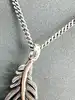collier thomas sabot maille gourmette avec pendentif plume argent 925 millième (22 ct) 11,69g