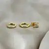 composition boucles d'oreilles en acier doré ornées d'oxydes