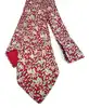 cravate hermès 100% soie rouge à motifs pommes, fleurs et feuillage