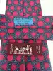 cravate hermès vintage en soie imprimée noeuds marins rose fuchsia et bleu