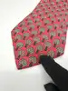 cravate hermès vintage en soie rouge à motif arbres