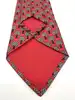 cravate hermès vintage en soie rouge à motif arbres