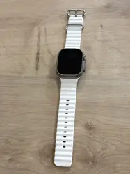 montre connectée apple watch ultra + cellular, boîtier titane 49mm avec bracelet océan blanc