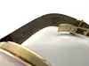 montre tissot t063610a, mouvement quartz, cadran noir, boîtier doré et bracelet en cuir noir