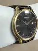 montre tissot t063610a, mouvement quartz, cadran noir, boîtier doré et bracelet en cuir noir