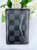organizer de poche louis vuitton en toile damier graphit avec initial  t.b a l'interieur