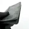 organizer de poche louis vuitton en toile damier graphit avec initial  t.b a l'interieur