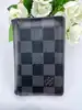 organizer de poche louis vuitton en toile damier graphit avec initial  t.b a l'interieur