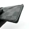 organizer de poche louis vuitton en toile damier graphit avec initial  t.b a l'interieur