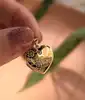 pendentif "boîte photo" forme coeur en 2 ors or 750 millième (18 ct) 1,35g
