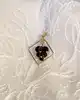 pendentif en or centré d'une grappe de raisins en pierre de grenat or 750 millième (18 ct) 1,46g