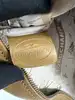 pochette / trousse longchamp en cuir grainé camel avec détails métalliques argentés