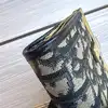 porte-monnaie christian dior vintage en toile oblique avec un fermoir clip doré