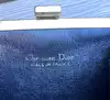 porte-monnaie christian dior vintage en toile oblique avec un fermoir clip doré