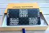 portefeuille louis vuitton brazza en toile damier graphite christhopher nehmet
