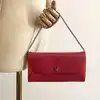 portefeuille sur chaîne dior addict rendez-vous en cuir rose et orange