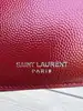 portefeuille yves saint laurent en cuir rouge matelassé grain de poudre avec logo argenté