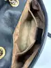 sac à bandoulière gucci gg marmont mini matelassé en cuir souple noir avec bijouterie dorée