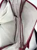 sac besace bandoulière lacoste rouge et bleu marine