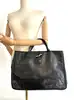 sac cabas longchamp roseau en cuir verni noir effet froissé avec son fermoir métallique argenté