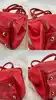 sac longchamp gatsby en cuir rouge embossé façon python
