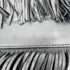 sac tote à fringes gérard darel flower en cuir noir à bandoulière