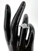 bague bague solitaire centrée d'un oxyde épaulé de 2 lignes de petits oxydes argent 925 millième (22 ct) 3,01g