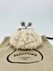 mini sac fourré max mara weekend fluffy pasticcino bag nano blanc avec bandoulières chaîne et mousqueton
