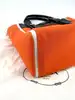 sac à main prada ouverture en toile orange et cuir noir