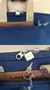sacoche porte-documents/sac de voyage lancel bleu marine en toile et cuir avec cadenas et clés