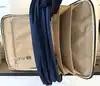 sacoche porte-documents/sac de voyage lancel bleu marine en toile et cuir avec cadenas et clés